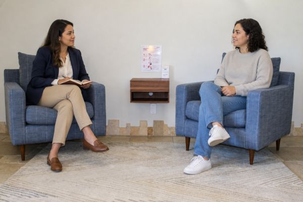 Therapist speaking with a client during a one-on-one therapy session at Creative Recovery LA